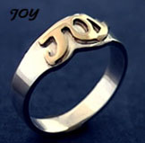gold and silver ring - Joy